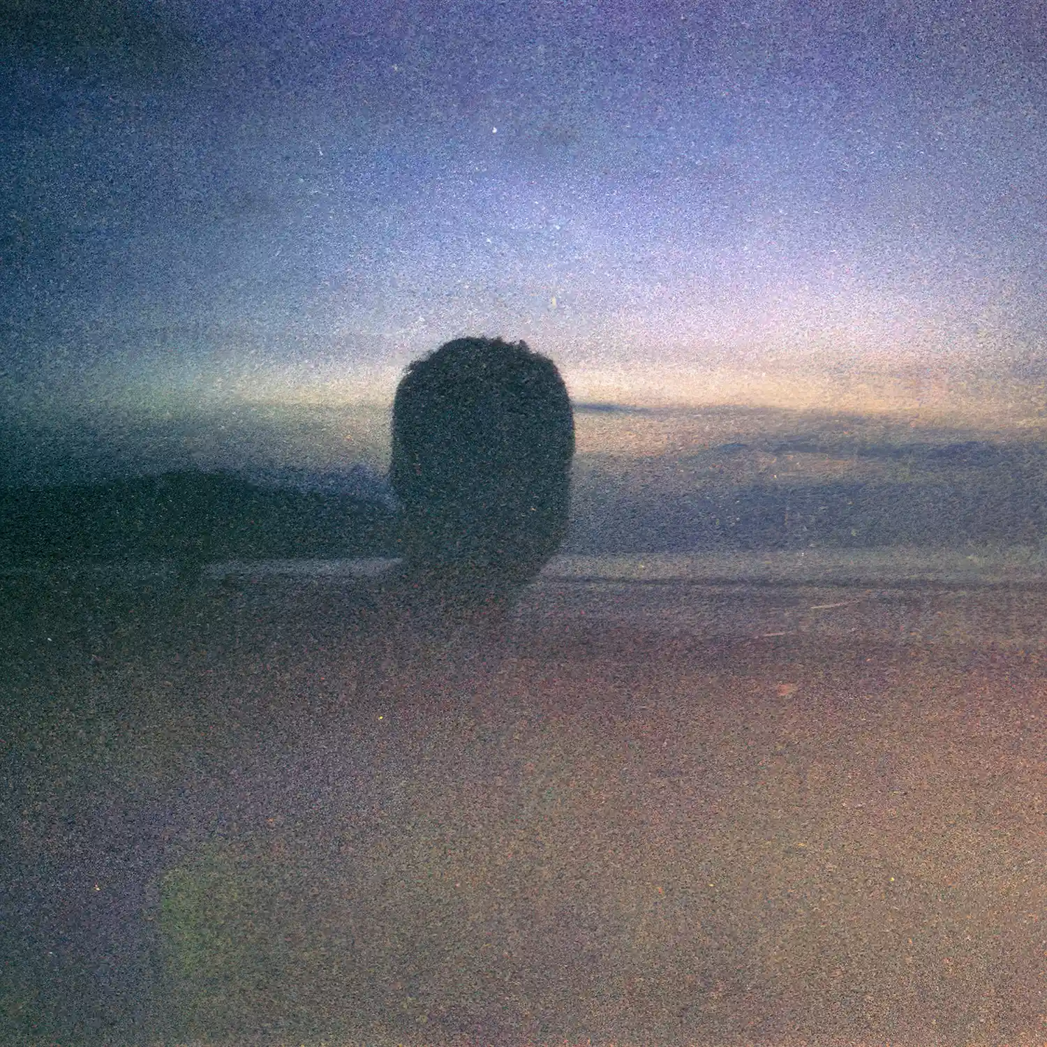Album cover for Twilight Cities by Morgan Visconti - a hazy film photo of a silhouette of a man (assumed to be Morgan) against a deep purple dusk and a beach.